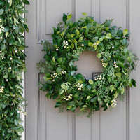 Couronne extérieur de cyprès à baies blanches